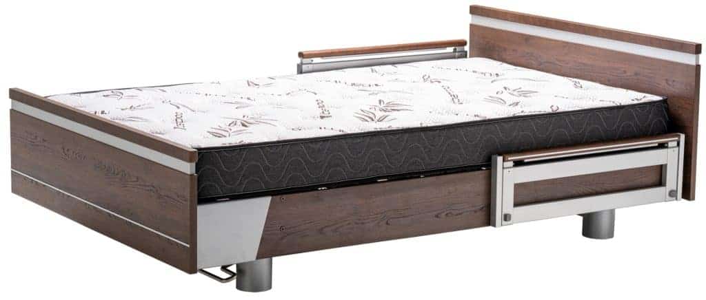 a bed with a drawer underneath it.