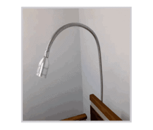 a light that is on a wall in a room.