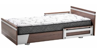 a bed with two drawers underneath it.