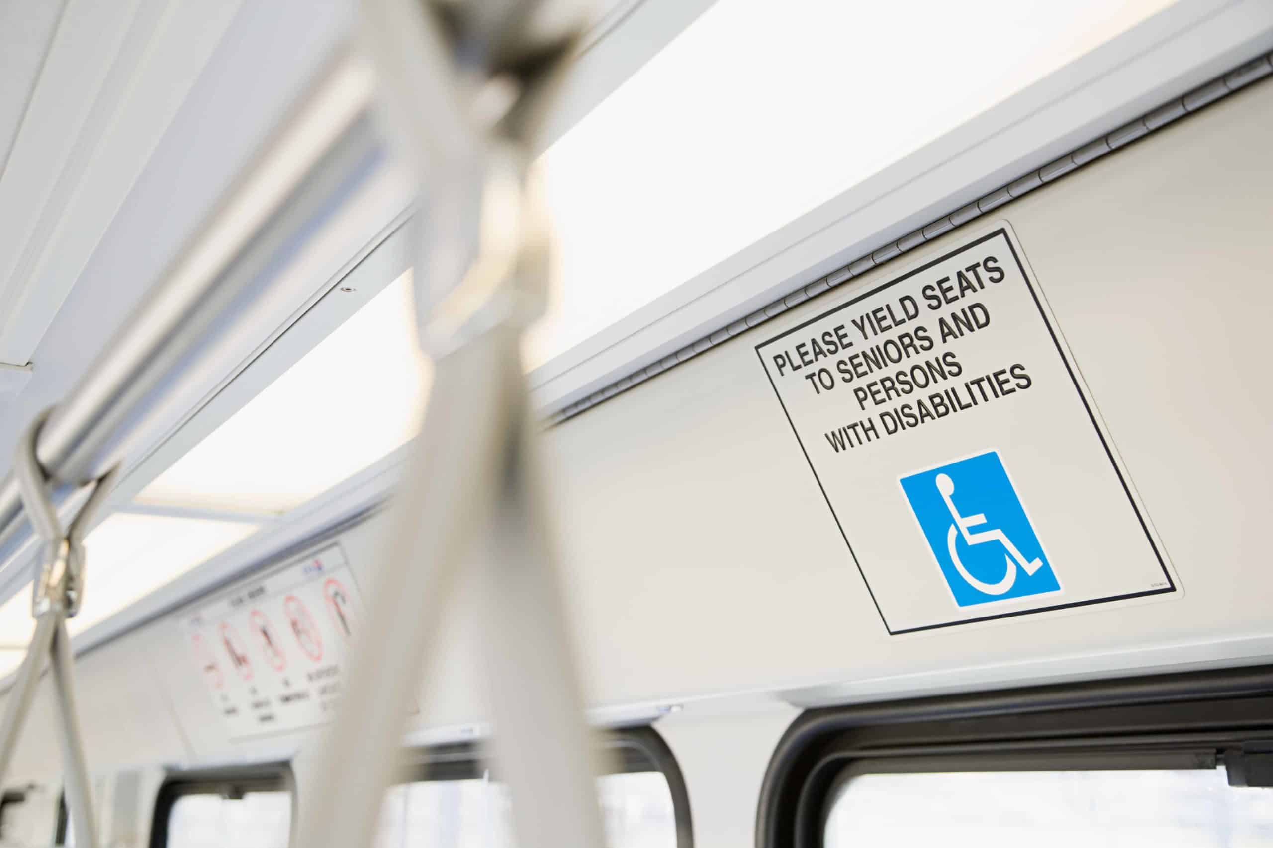 a sign on the side of a subway car.