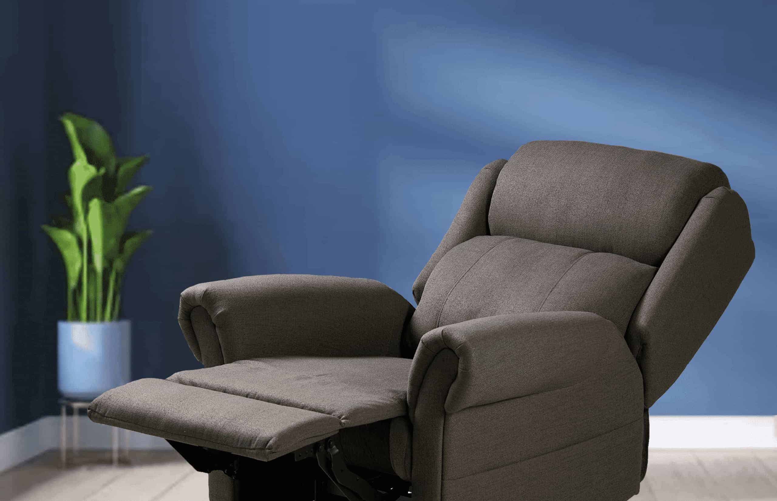 A products with a footrest and recliner in a room.