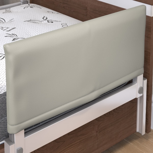 An image of a bed frame with a Fall Mat (Copy) for added safety.