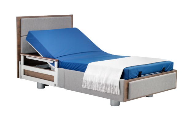 a hospital bed with a blue sheet on it.