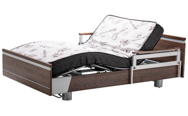 a bed with a wooden frame and a mattress.