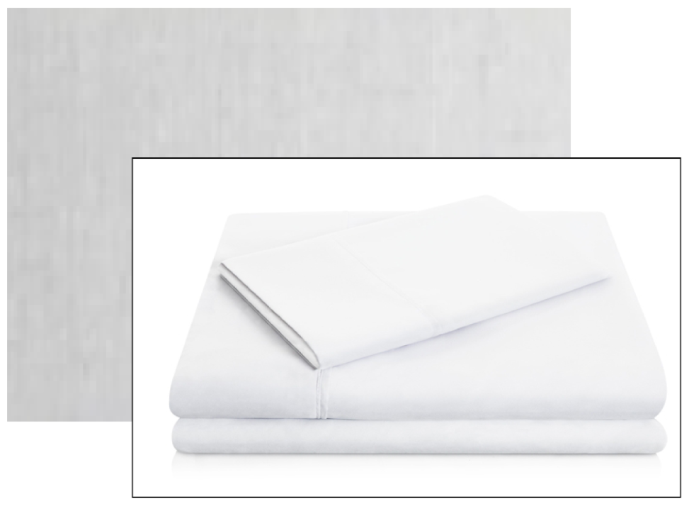 Folded white bed sheets on display against a light background. #15395