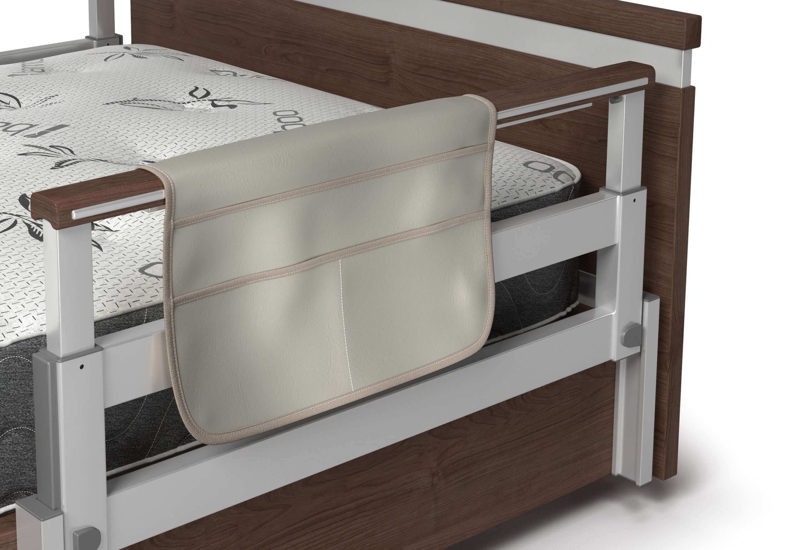 A beige organizer pouch hanging on the wooden side rail of a bed with a patterned mattress.