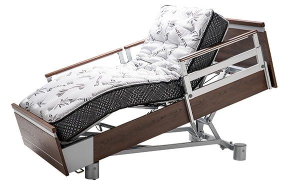 Adjustable hospital bed with a metal frame, wood panel accents, and a patterned mattress, shown in a raised head and knee position.