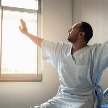 a man finally rising from a hospital bed to face the day