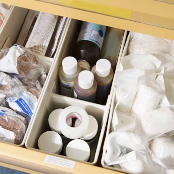a drawer filled with lots of different types of items.